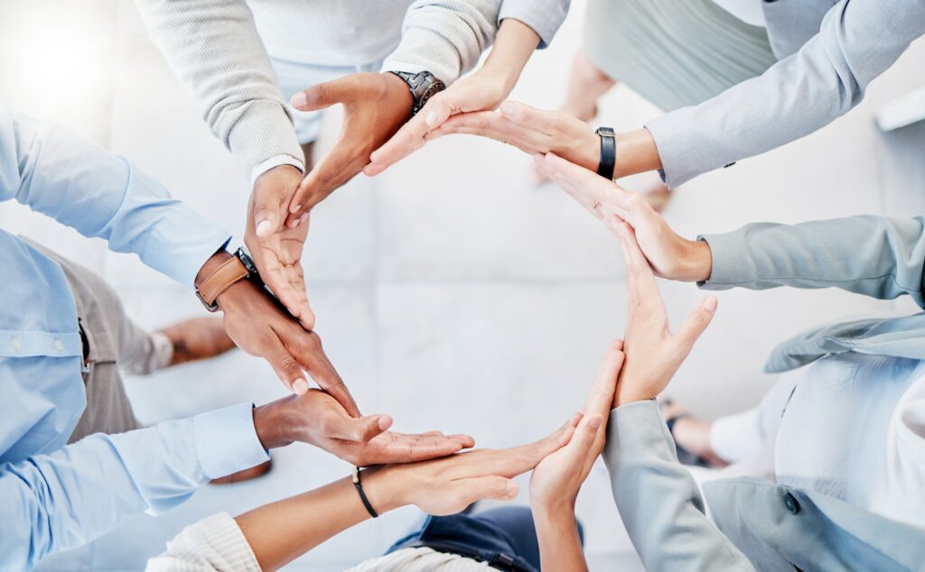 Support, team building and hands of business people in a circle for collaboration, trust and commun